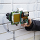 Illustration for article titled Guy invents an 8-Bit instant camera gun that prints images on receipts